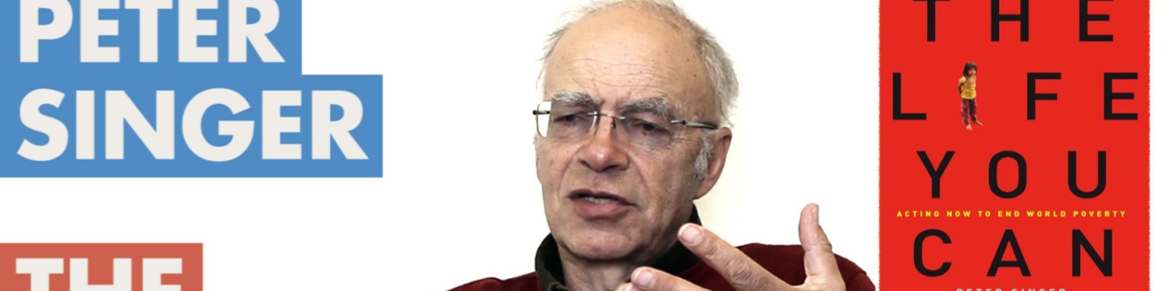 Peter Singer lecturing. The Life You Can Save book is to his right.