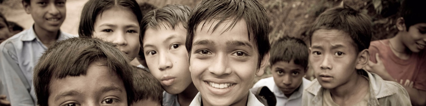 Several children pose for a photo